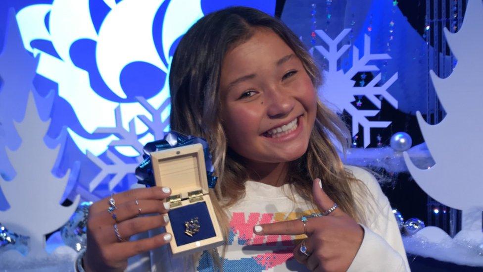 Sky Brown with her Blue Peter badge