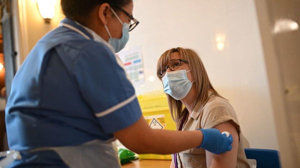 Woman being vaccinated in Hull on 7 May