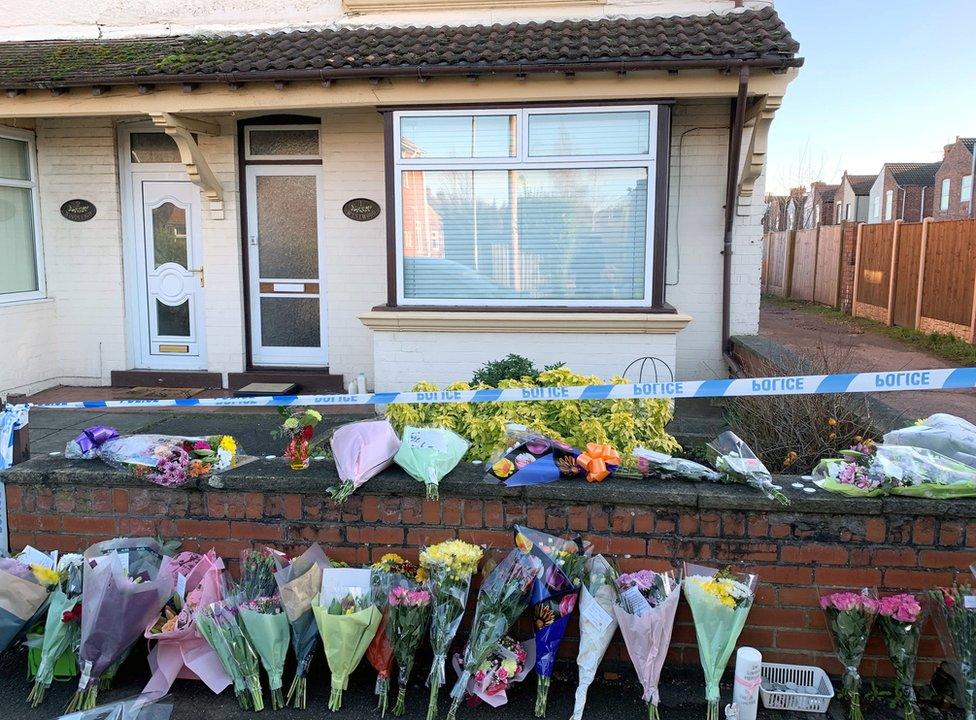 Flowers outside house in Station Road