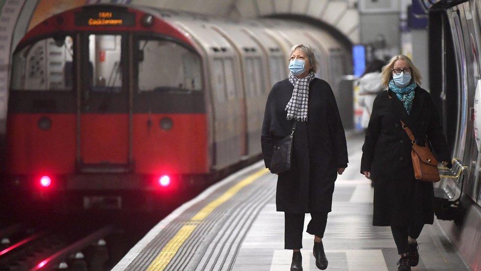 Two female passengers on Tube platform