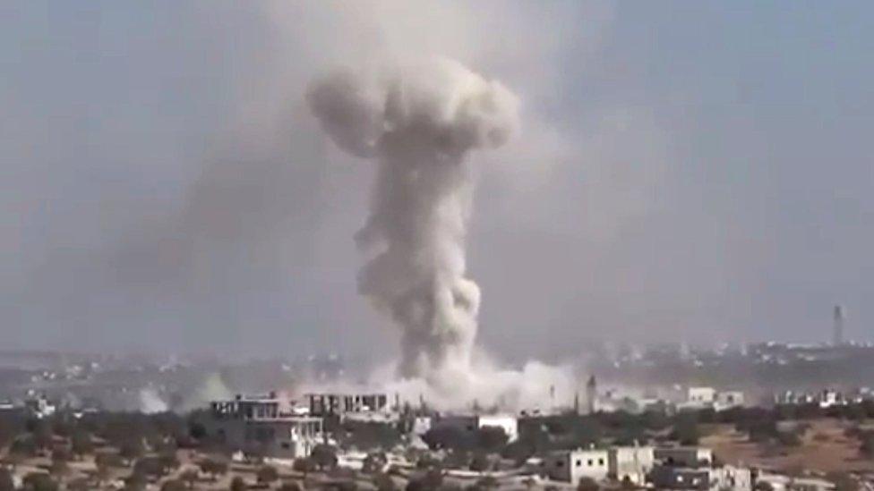 Video provided by Revolutionary Forces of Syria, an opposition activist media organisation, purportedly showing smoke rising from village of Haas, Idlib province, after air strike on 26 October 2016