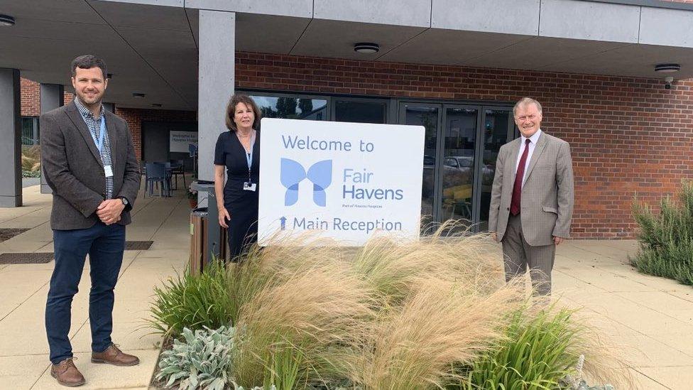 Sir David Amess with staff at Fair Havens