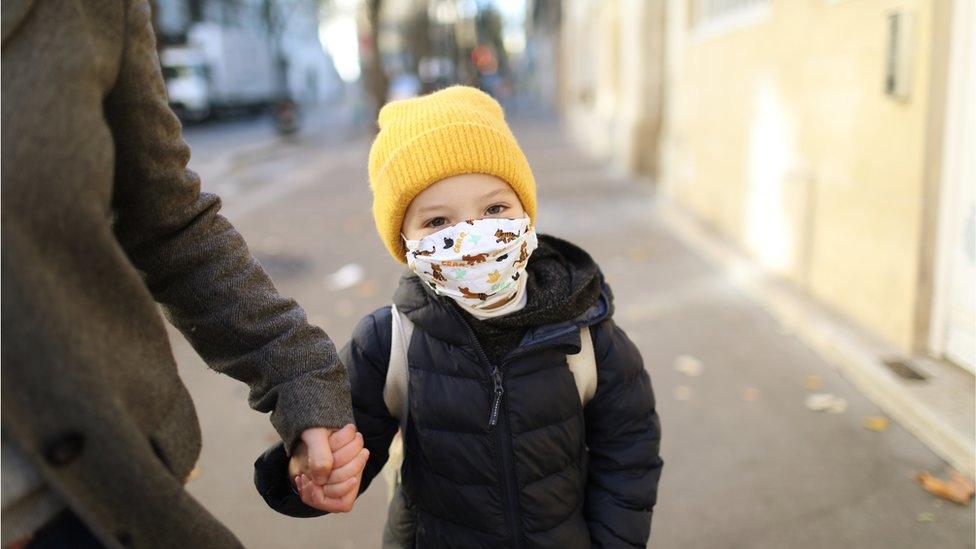 Young girl with a Covid facemask