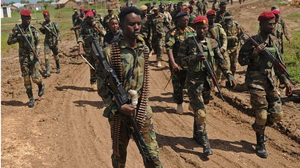 Somali soldiers march at a military base 450 km south of the capital Mogadishu