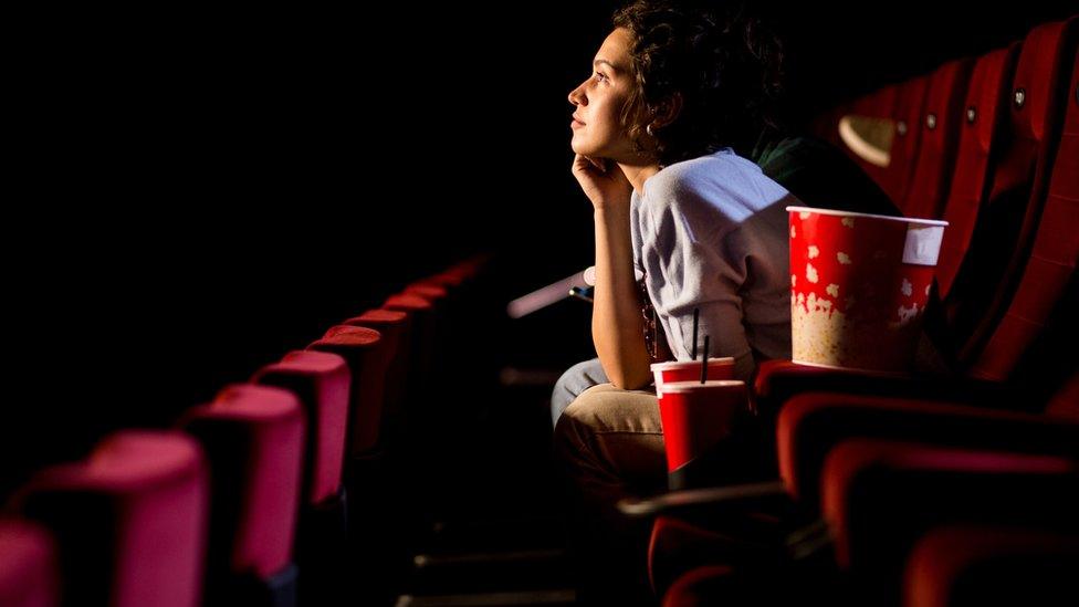 Woman watching cinema