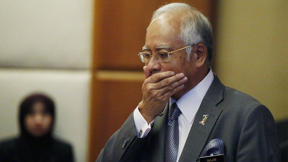 Malaysia's Prime Minister Najib Razak arrives at a presentation for government interns at the Prime Minster's office in Putrajaya, Malaysia, in this July 8, 2015 file photo