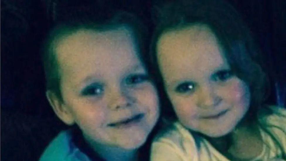 A picture of Brandon and Lacie Pearson who were killed in a house fire. They are both young children, aged eight and seven, with dark hair and smiling at the camera. 