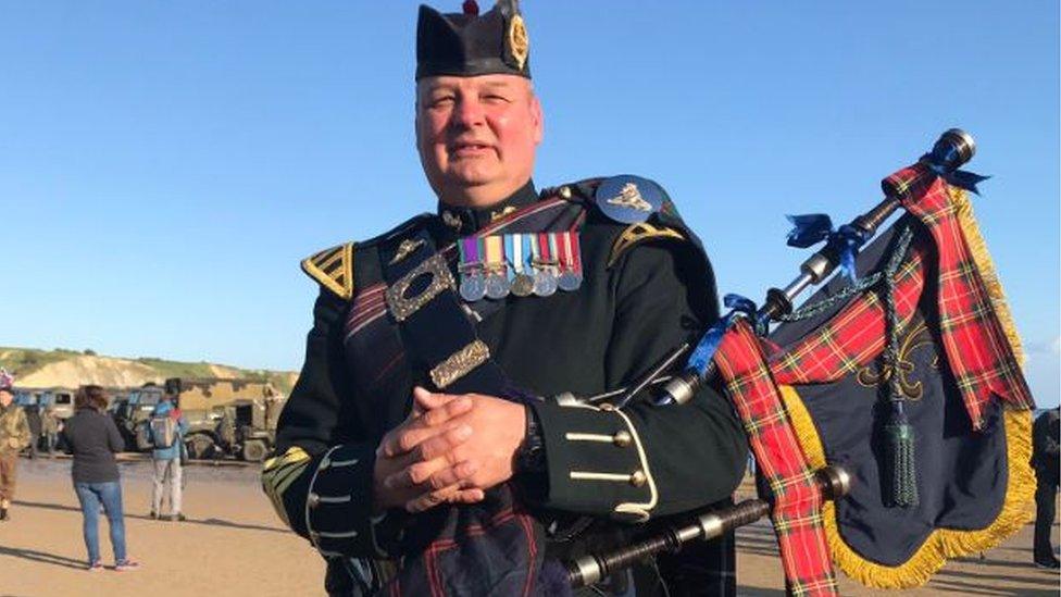 Pipe Major Trevor Macey-Lillie played Highland Laddie on the Mulberry Harbour at Arromanches