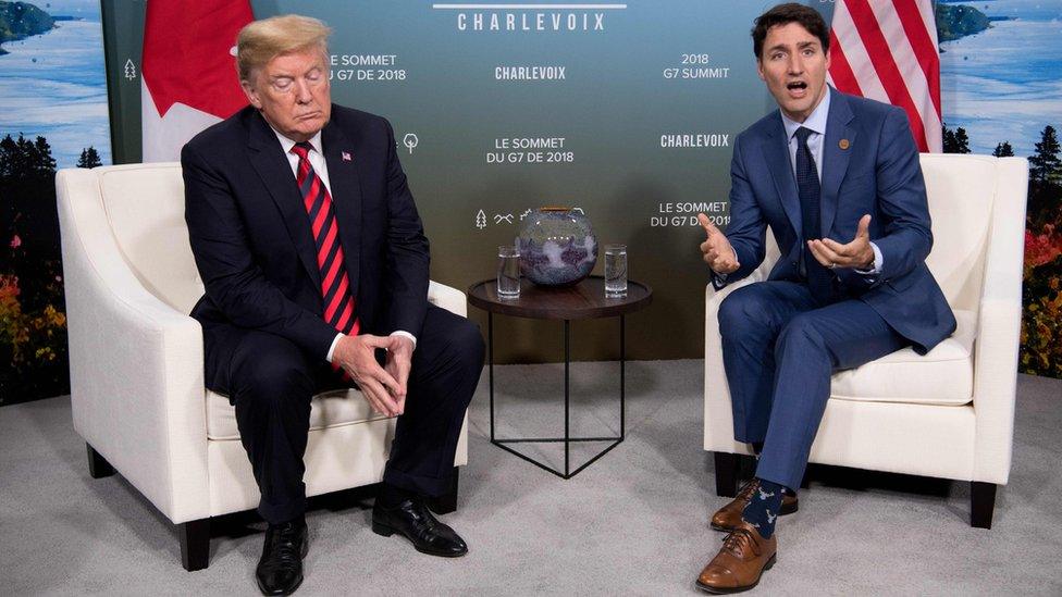 In this file photo taken on June 8, 2018 US President Donald Trump and Canadian Prime Minister Justin Trudeau hold a meeting on the sidelines of the G7 Summit in La Malbaie, Quebec, Canada.