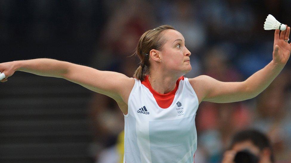 Susan Egelstaff holding a shuttlecock and preparing to swing her racket at the London Olympic Games in 2012