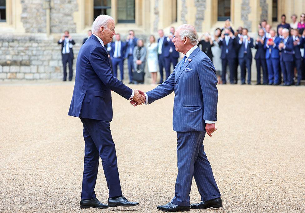 The President of the United States, Joe Biden shakes hands with King Charles III in the Quadrangle at Windsor Castle on 10 July 2023 in Windsor, England