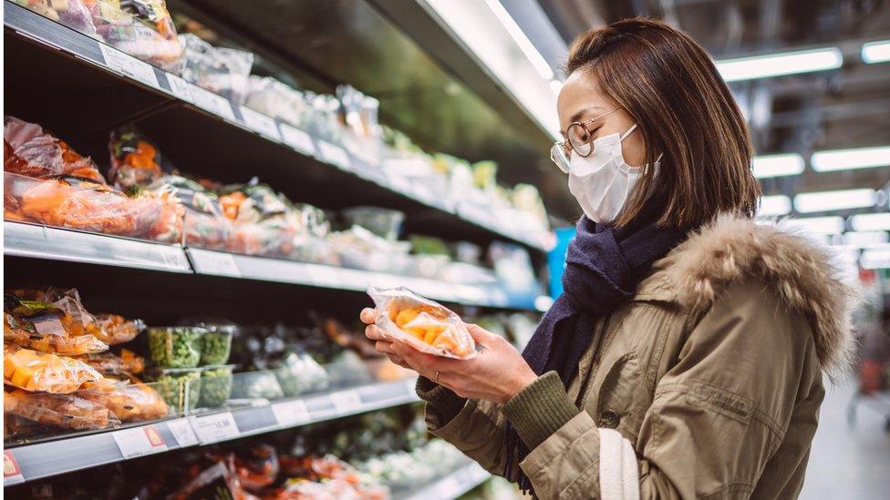 Shopper wearing face mask