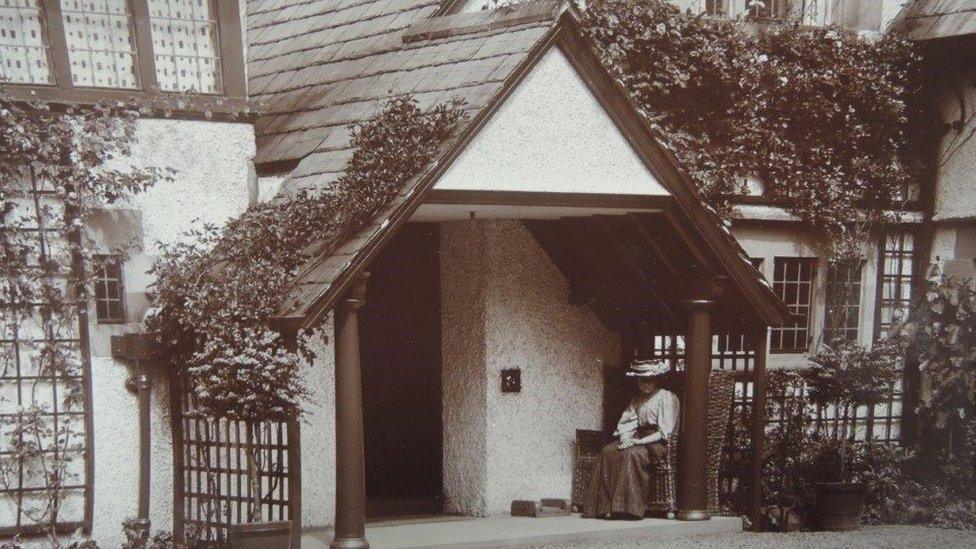 Photo believed to be of Beatrix Potter sat in the porch of Broad Leys