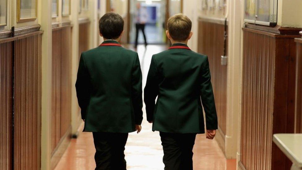 Schoolboys make their way to class at Altrincham Grammar School for Boys