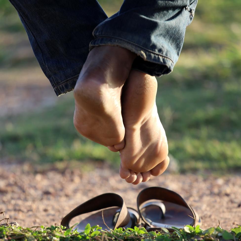 Bare feet and sandals