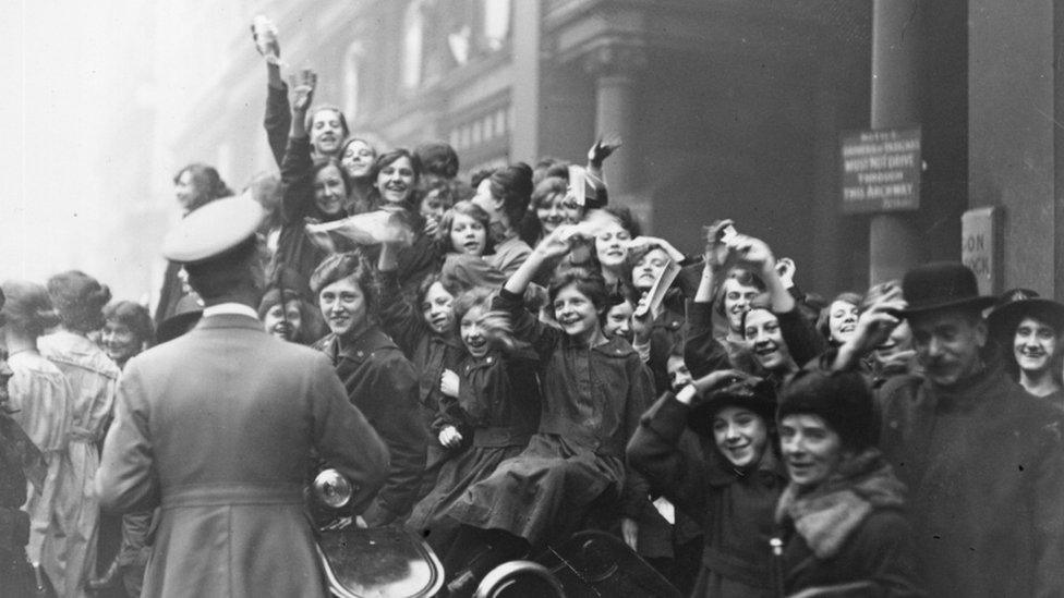 People celebrating Armistice in London