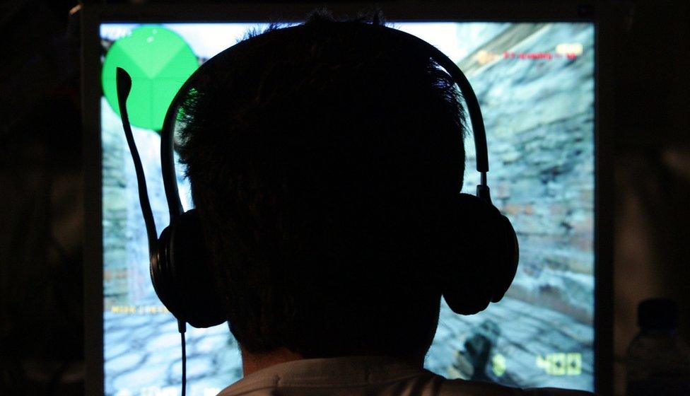 Gamer during e-sports with headset on