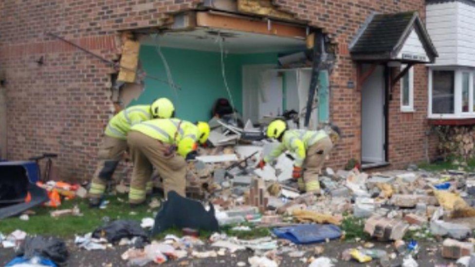 A house struck by a car in Grays, Essex