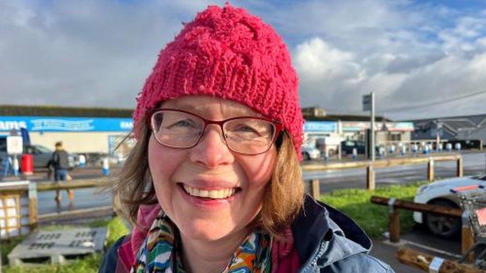 Farmer Emma Tacon outside Lathams Discount Store in Potter Heigham