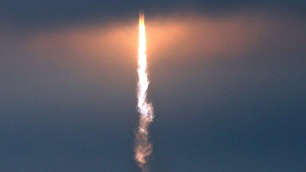 The SpaceX Falcon 9 rocket disappears into clouds after it lifted off on a supply mission to the International Space Station (19 February 2017)