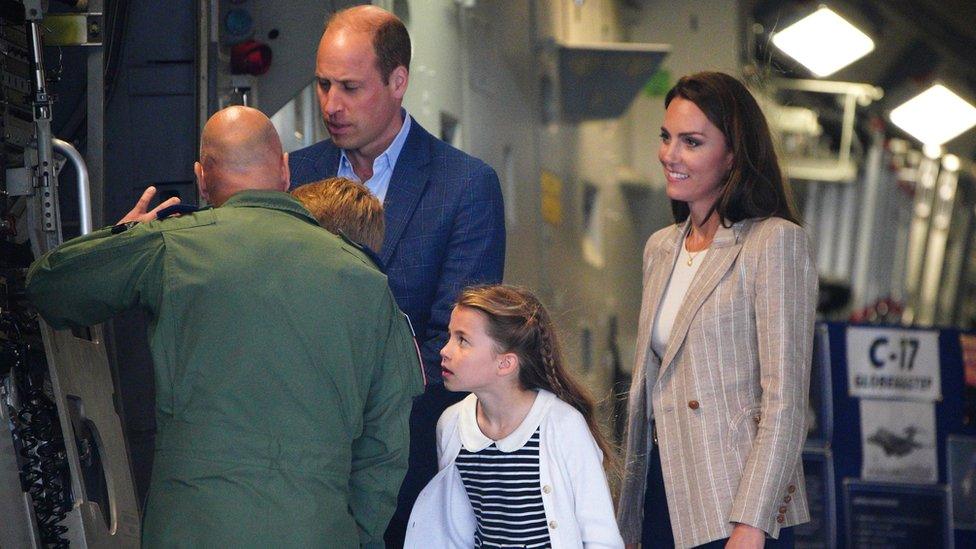 Prince William with Kate and Charlotte