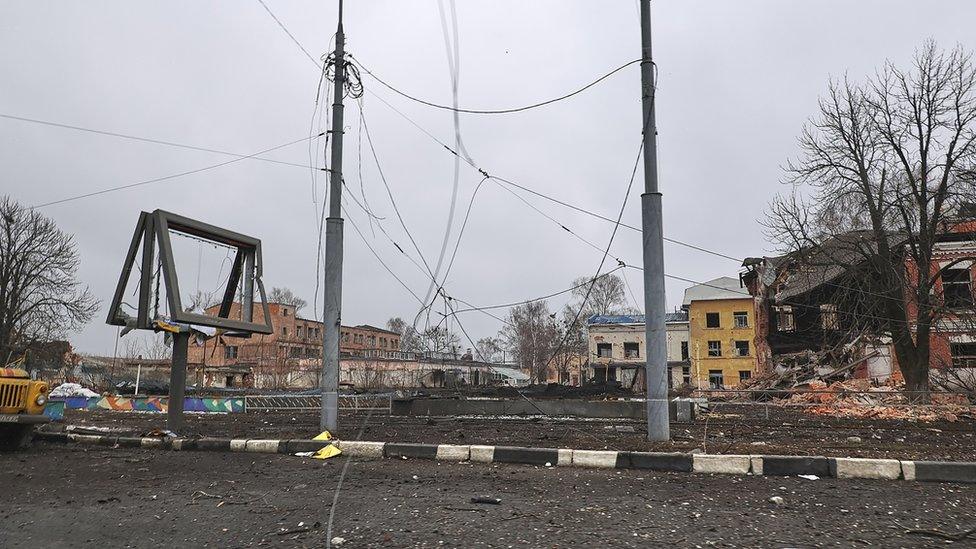 A general view of a damaged road after shelling in the city of Kharkiv, Ukraine, 02 March 2022. Russian troops entered Ukraine on 24 February prompting the country"s president to declare martial law and triggering a series of severe economic sanctions imposed by Western countries on Russia