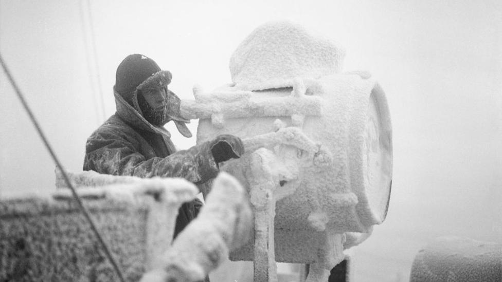 Ice forming on a signal projector on the cruiser HMS Sheffield in December 1941