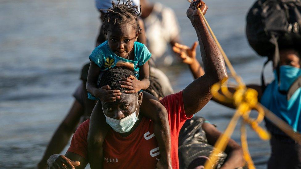 Migrants cross Rio Grande