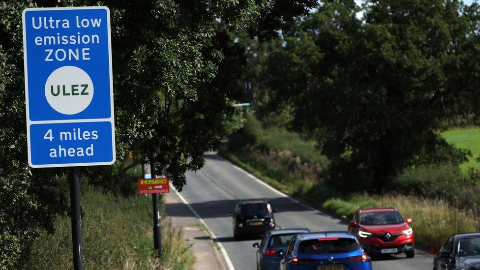 A sign announces the boundary for the Ultra Low Emission Zone (ULEZ)