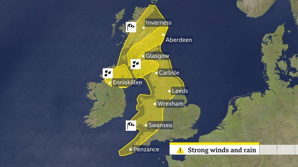 Map of the UK showing a yellow warning area for wind covering all of Northern Ireland, Wales and northern England, large parts of Scotland, and much of the Midlands and south-west England; and two smaller rain warning areas in Scotland plus one in Northern Ireland.