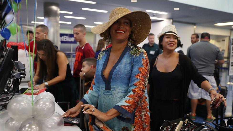 Passengers board their flight to Santa Clara, Cuba.