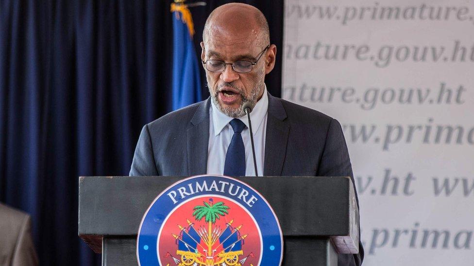 Ariel Henry speaks during a conference as he takes office as Prime Minister of Haiti at the Prime Minister's Office on July 20, 2021