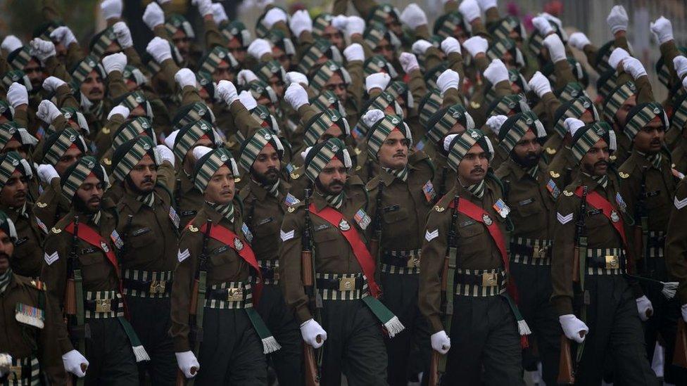 Indian soldiers march past during Indias 74th Republic Day parade in New Delhi on January 26, 2023.