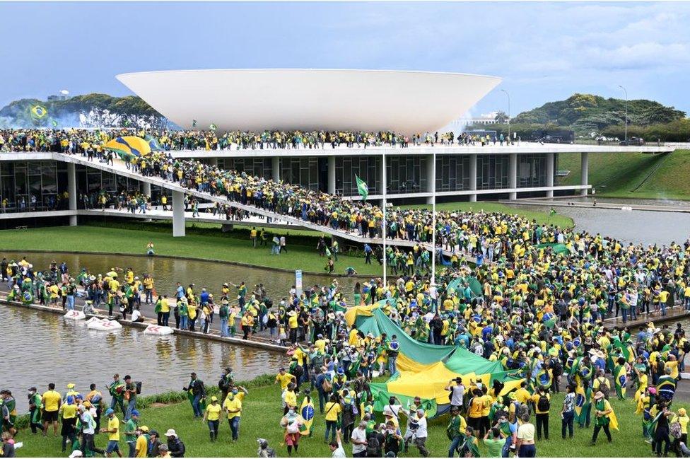 Supporters of Brazilian former President Jair Bolsonaro hold a demonstration at the Esplanada dos Ministerios in Brasilia on January 8, 2023.