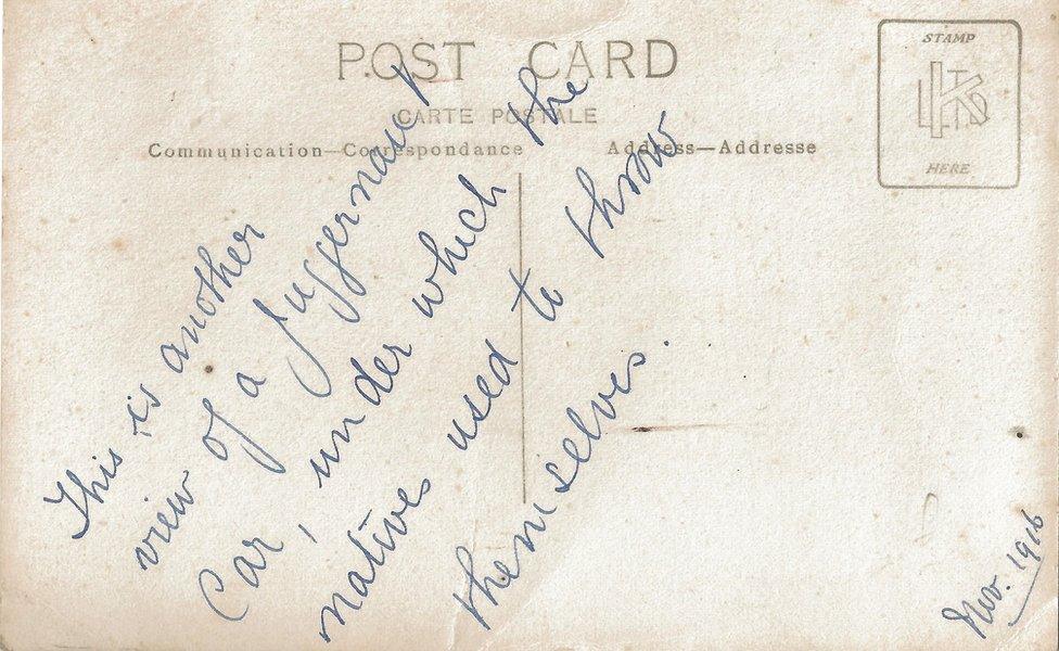 The back of a postcard that has a handwritten message saying: This is another view of a juggernaut car, under which natives used to throw themselves