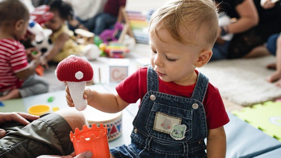 Stock image of a young child playing