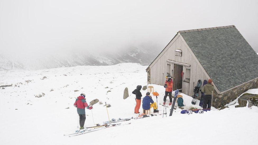 Skiers at the Lake District Ski Club on Raise, next to Helvellyn in the Lake District National Park