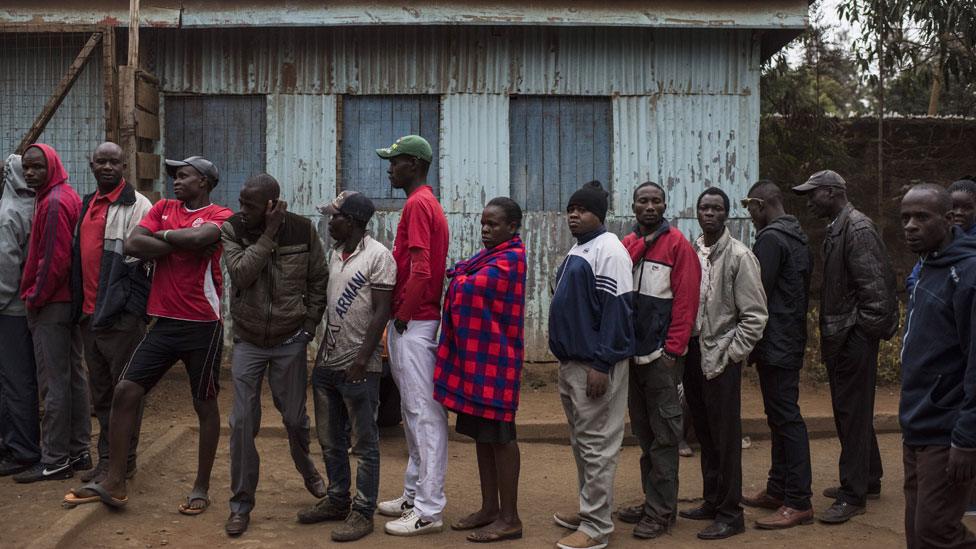 People gather to vote at Olympic Primary School in Kibera, one of the largest slums in Africa, on August 8, 2017 in Nairobi, Kenya. Kenyans head to the polls for a closely contested election between incumbent president Uhuru Kenyatta and his rival Raila Odinga.