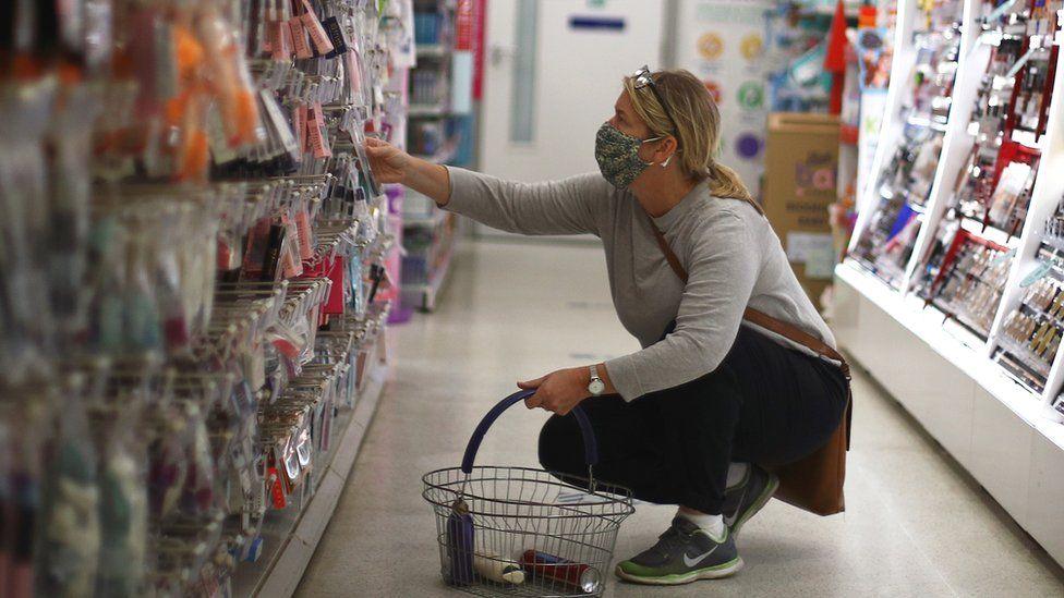 Woman shopping in mask