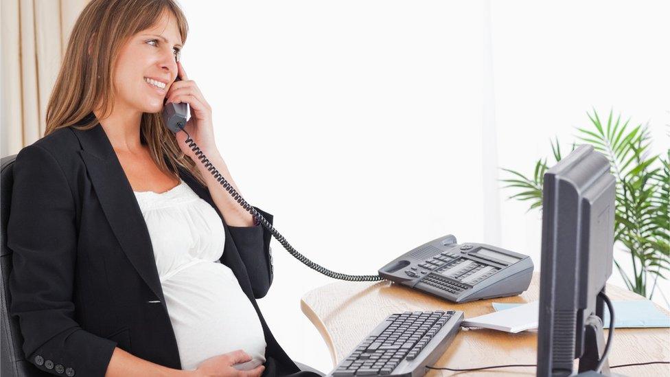 Pregnant woman on the phone