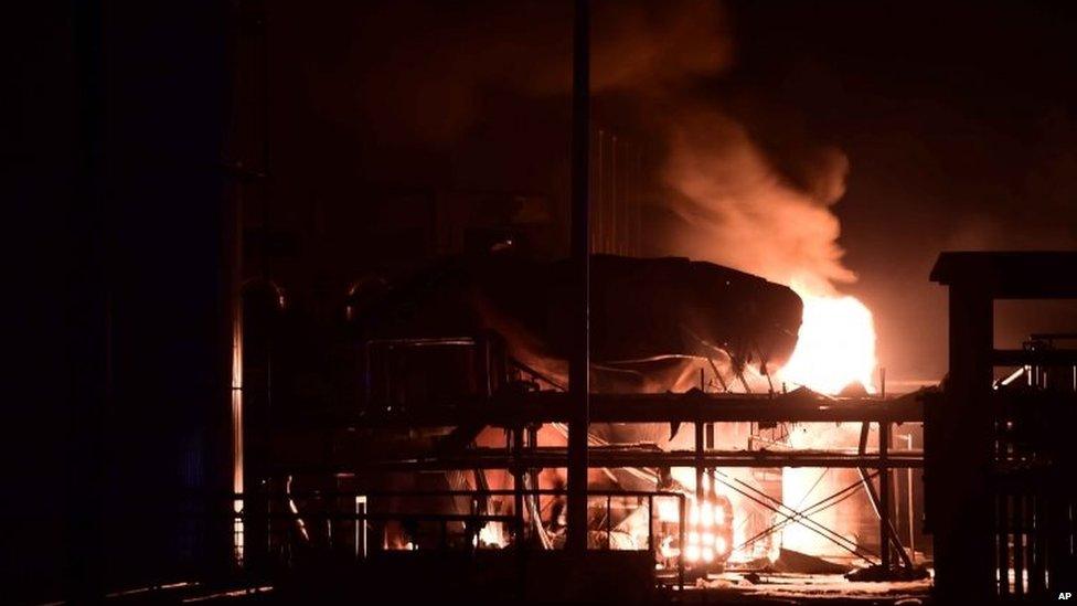 Fire burns at a plant of Shandong Runxing Chemical Technology Co after an explosion in Zibo, Shandong Province 23/08/2015