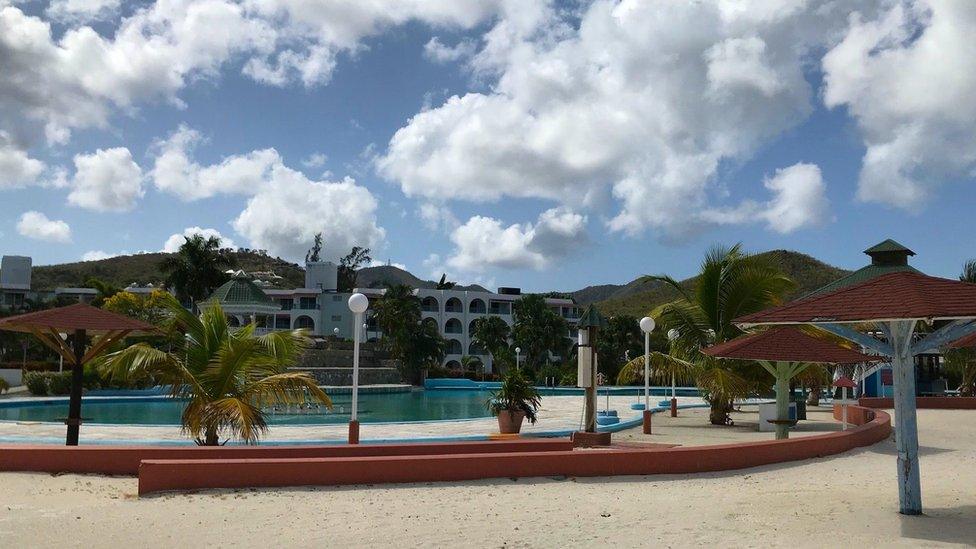 An empty pool at the Starfish Jolly Beach resort