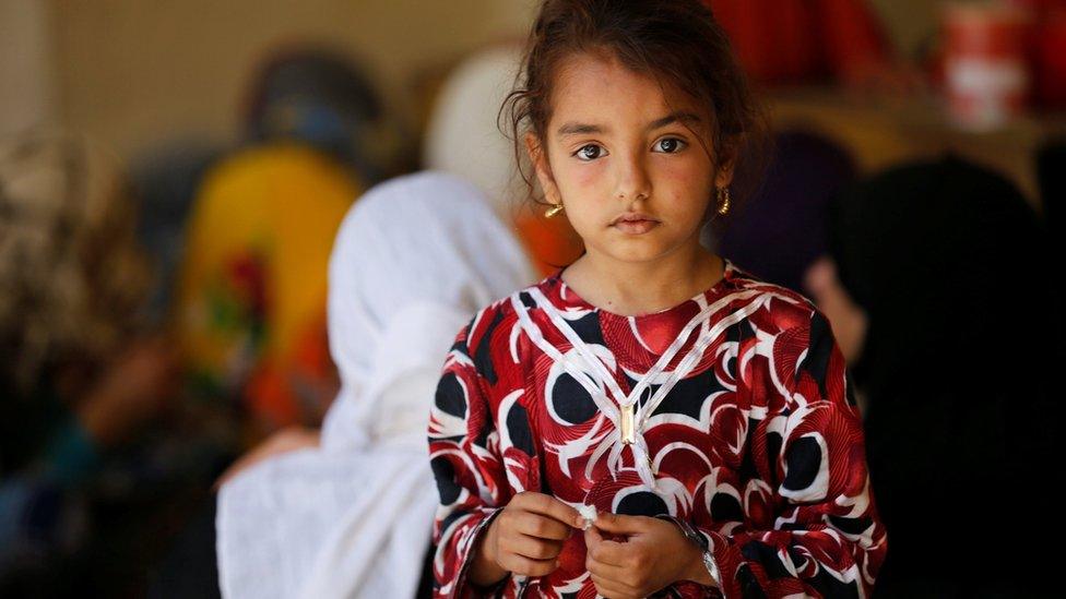 An Iraqi girl who has fled her home due to the clashes on the outskirts of Falluja, photographed in the town of Garma, Iraq (30 May 2016)