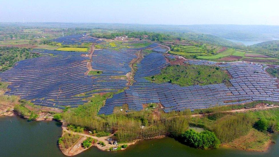 Solar panels on a hillside in a village in Chuzhou, in eastern China's Anhui province