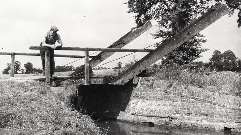 Man stood on lift bridge