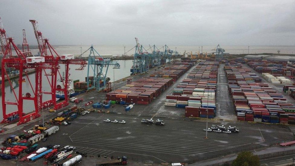 General view of stacked shipping containers at Peel Ports Liverpool docks in Liverpool