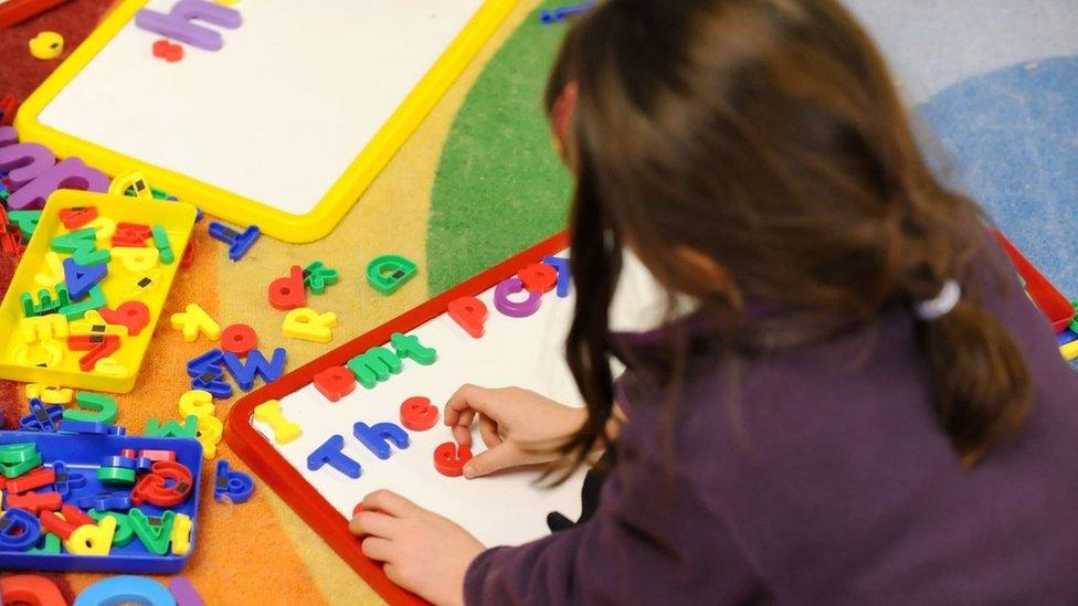 Pupil at work with letters