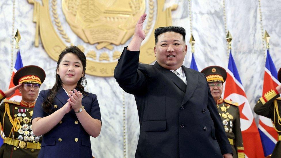 North Korean leader Kim Jong Un with his daughter at the parade