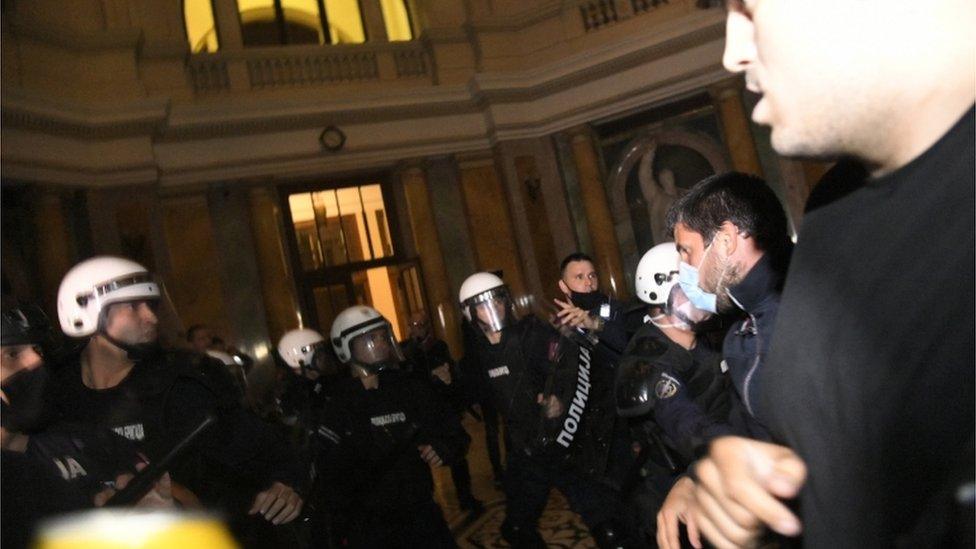 Police appearing to face off against protesters