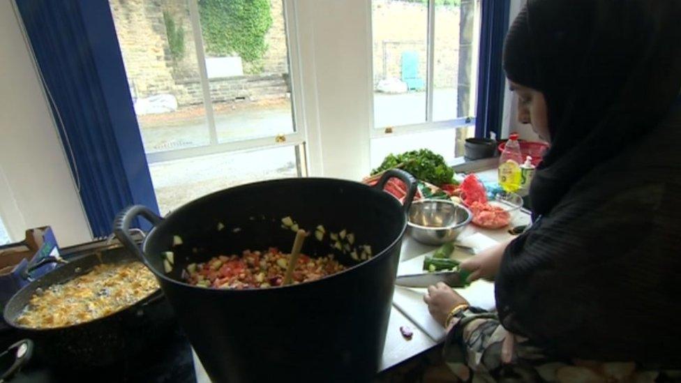 Volunteers cooking up the meals